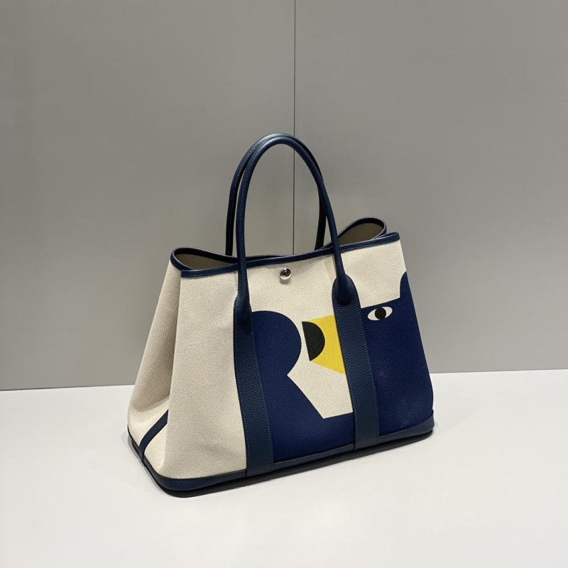 H**mes shopping bags